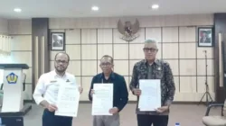 Kepala BPKAD Muaro Jambi,Alias.SH,MH Hadiri Rekonsiliasi dan Penandatanganan BAR Pajak Semester I Tahun 2025