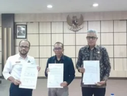 Kepala BPKAD Muaro Jambi,Alias.SH,MH Hadiri Rekonsiliasi dan Penandatanganan BAR Pajak Semester I Tahun 2025
